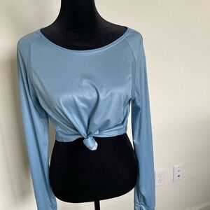 Tri Sirena crop light weight running top. Long sleeved. Size M EUC worn once.